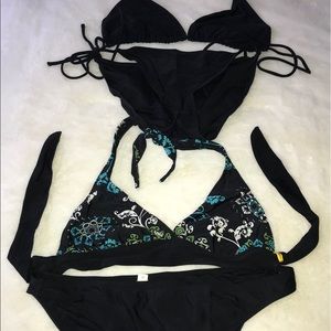 Pair of Black Bikinis OP String Bikini and Lole’.